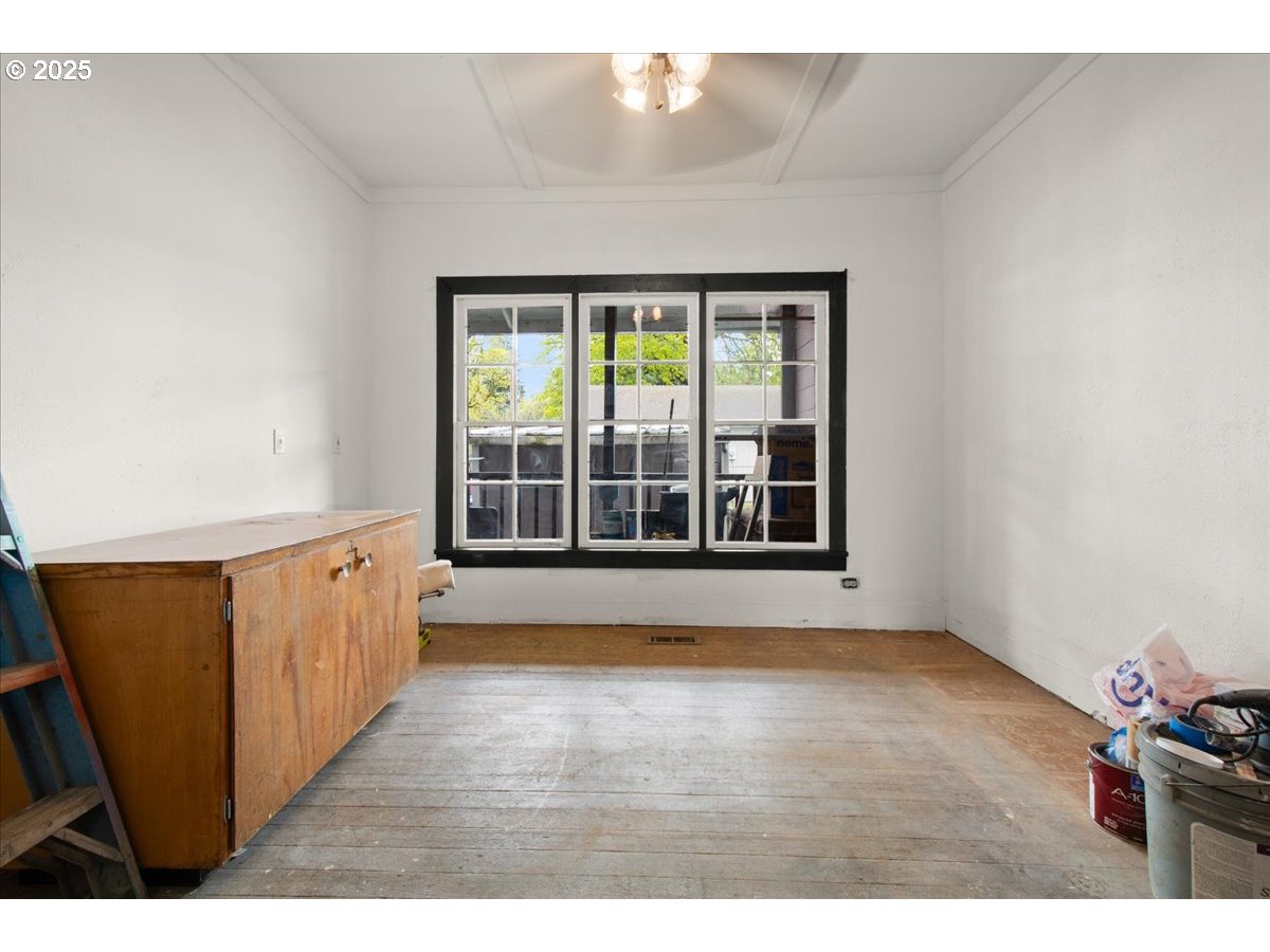 514 North Main Avenue Ridgefield, WA 98642 - Photo 6 of 16 a view of an empty room with wooden floor and a window