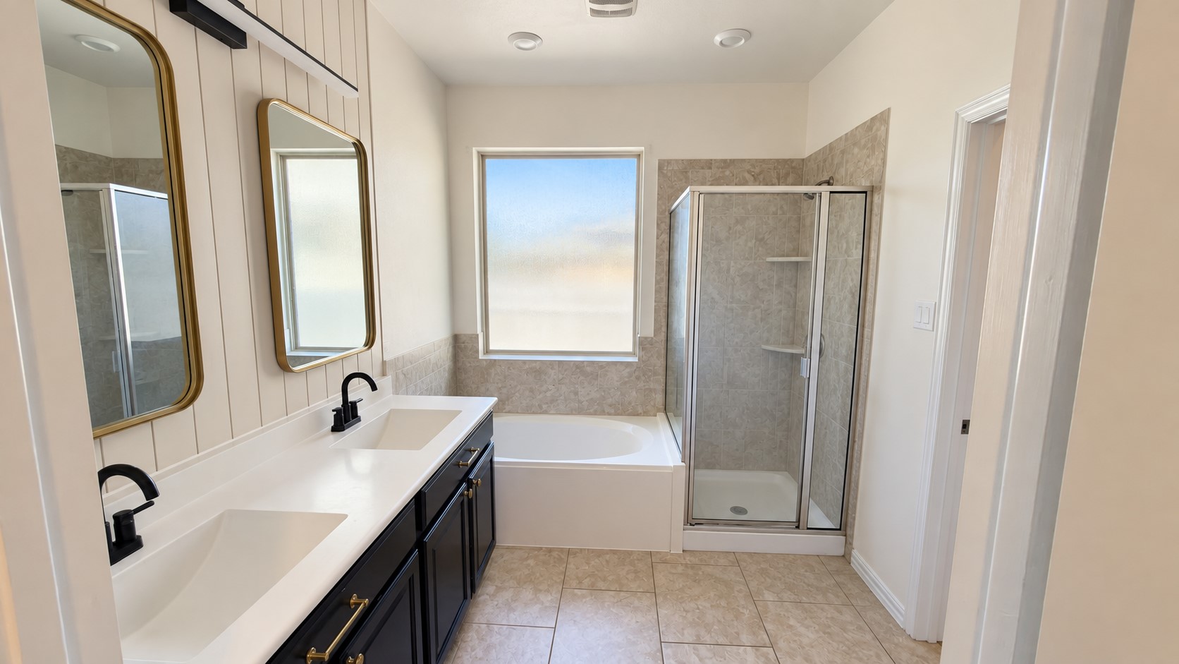 2500 Rough Berry Road Pflugerville, TX 78660 - Photo 14 of 15 A spacious bathroom features tiled flooring, a separate shower enclosure, and a large soaking tub.