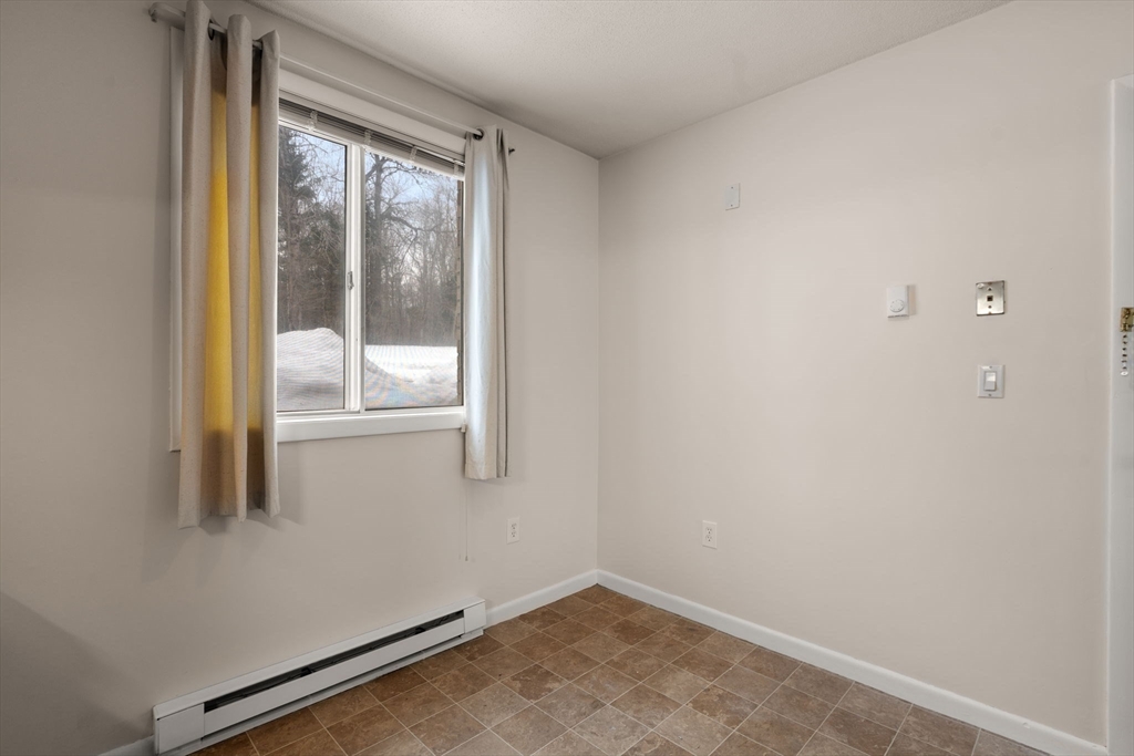 121 Bailey Street, Unit D31 Worcester, MA 01602 - Photo 13 of 25 a view of small space with sliding door