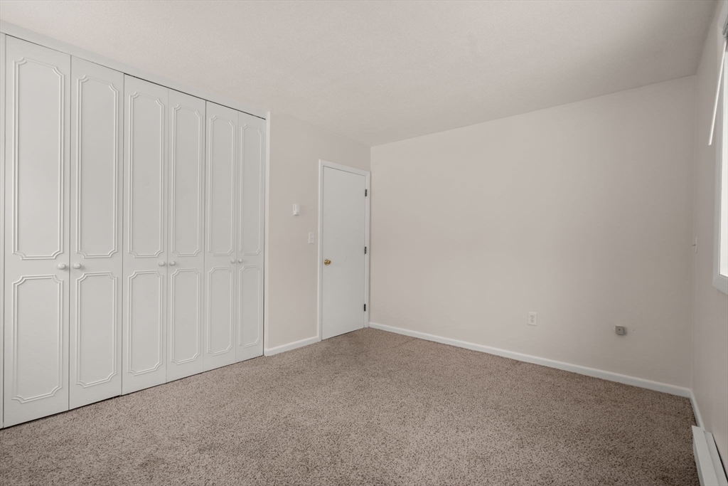 121 Bailey Street, Unit D31 Worcester, MA 01602 - Photo 17 of 25 a view of an empty room
