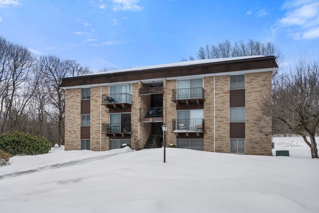 121 Bailey Street, Unit D31 Worcester, MA 01602 - Photo 21 of 25 front view of a house with a garage