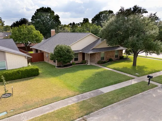 a view of a lake with a yard
