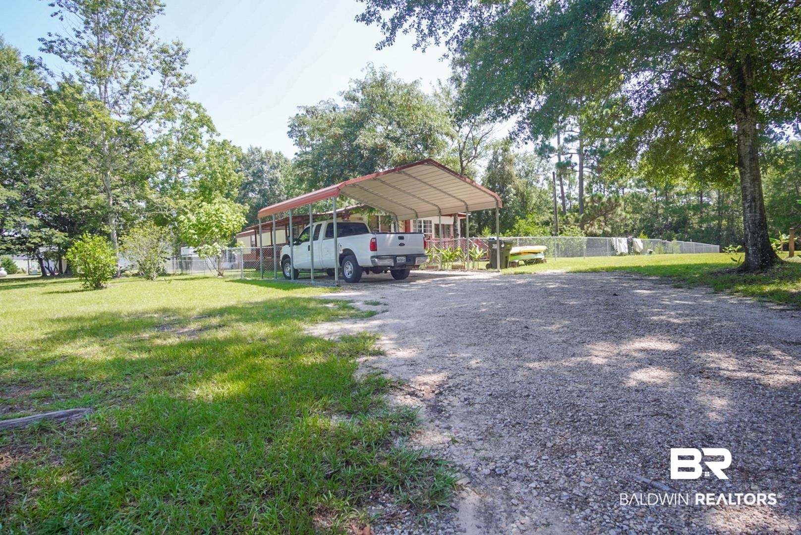 9190 County Road 97 Elberta, AL 36530 - Photo 52 of 53 View of yard featuring a carport