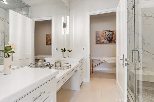 a white bath tub sitting in a bathroom