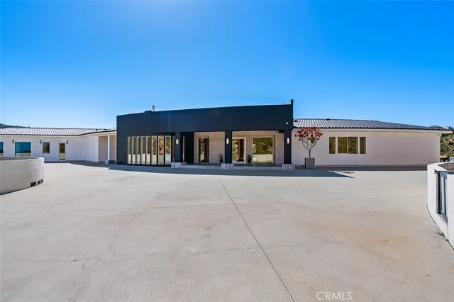 a front view of a house with a garage