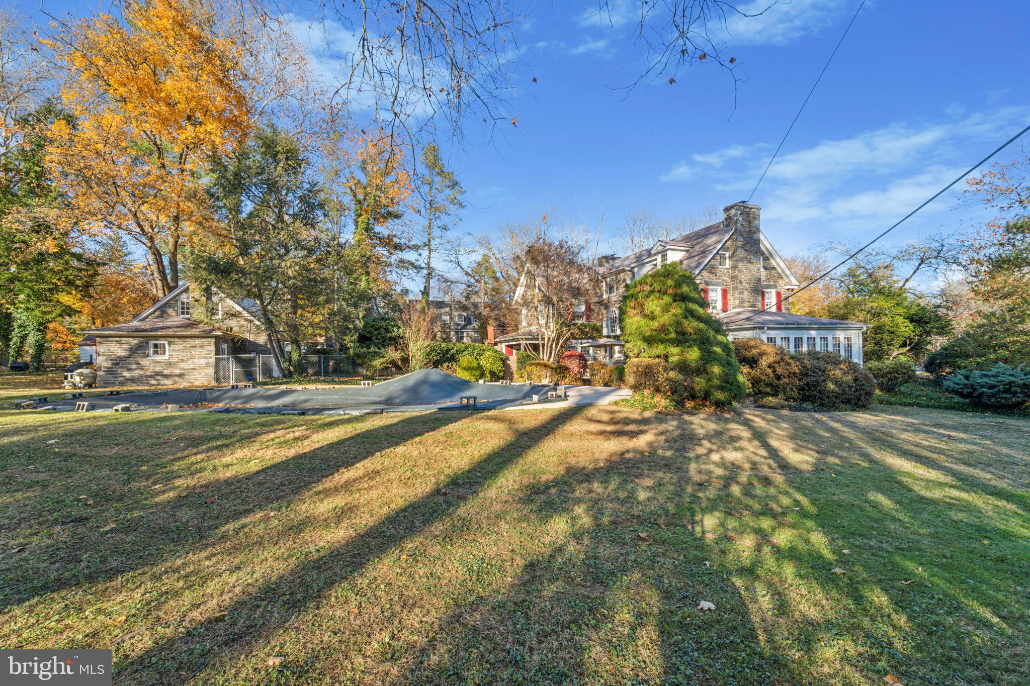 402 Penn Road Wynnewood, PA 19096 - Photo 13 of 75 View of expansive lawn from rear of property