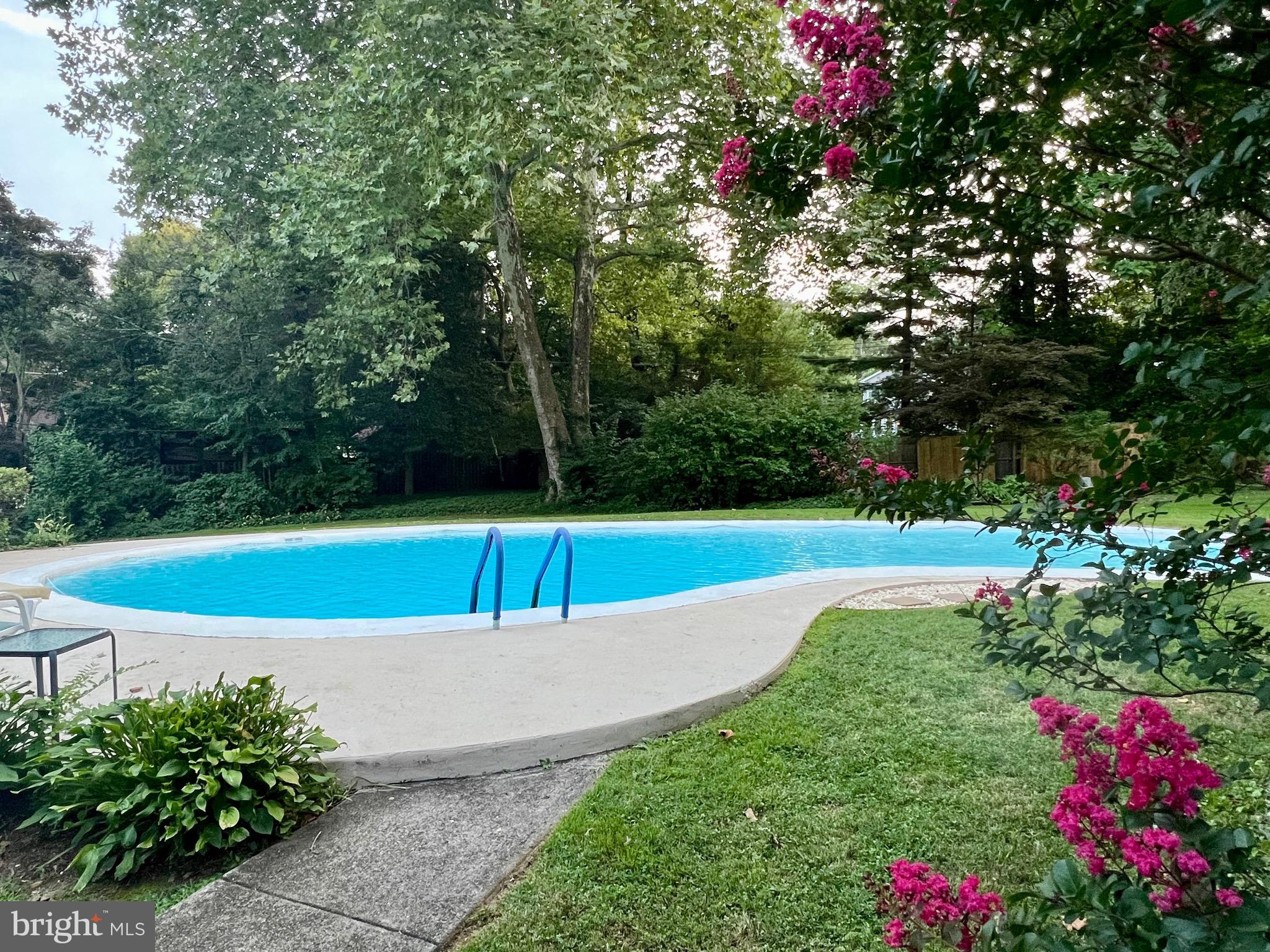 402 Penn Road Wynnewood, PA 19096 - Photo 21 of 75 a view of a tennis court with a small yard