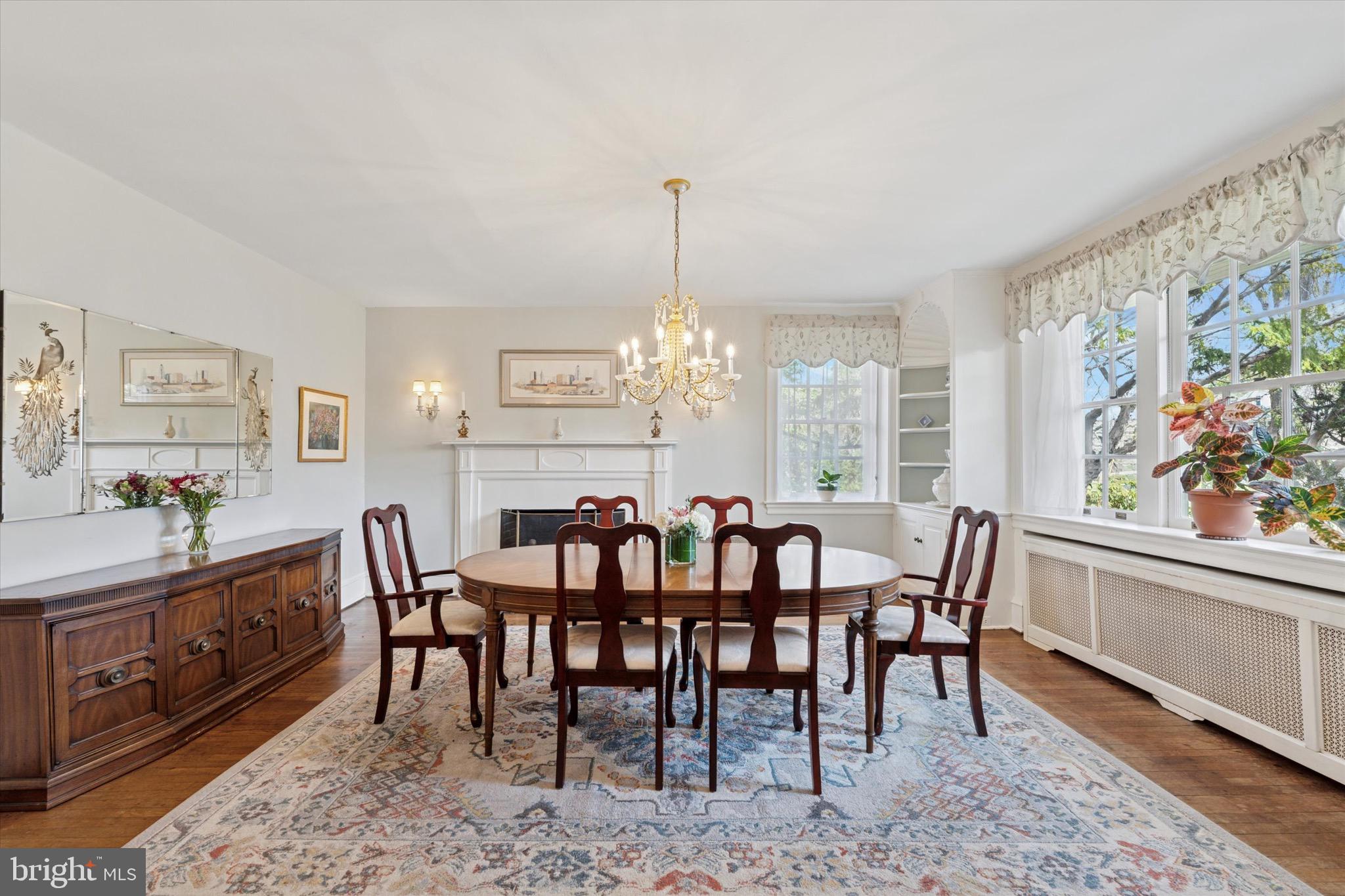 402 Penn Road Wynnewood, PA 19096 - Photo 32 of 75 a view of a dining room with furniture window and wooden floor