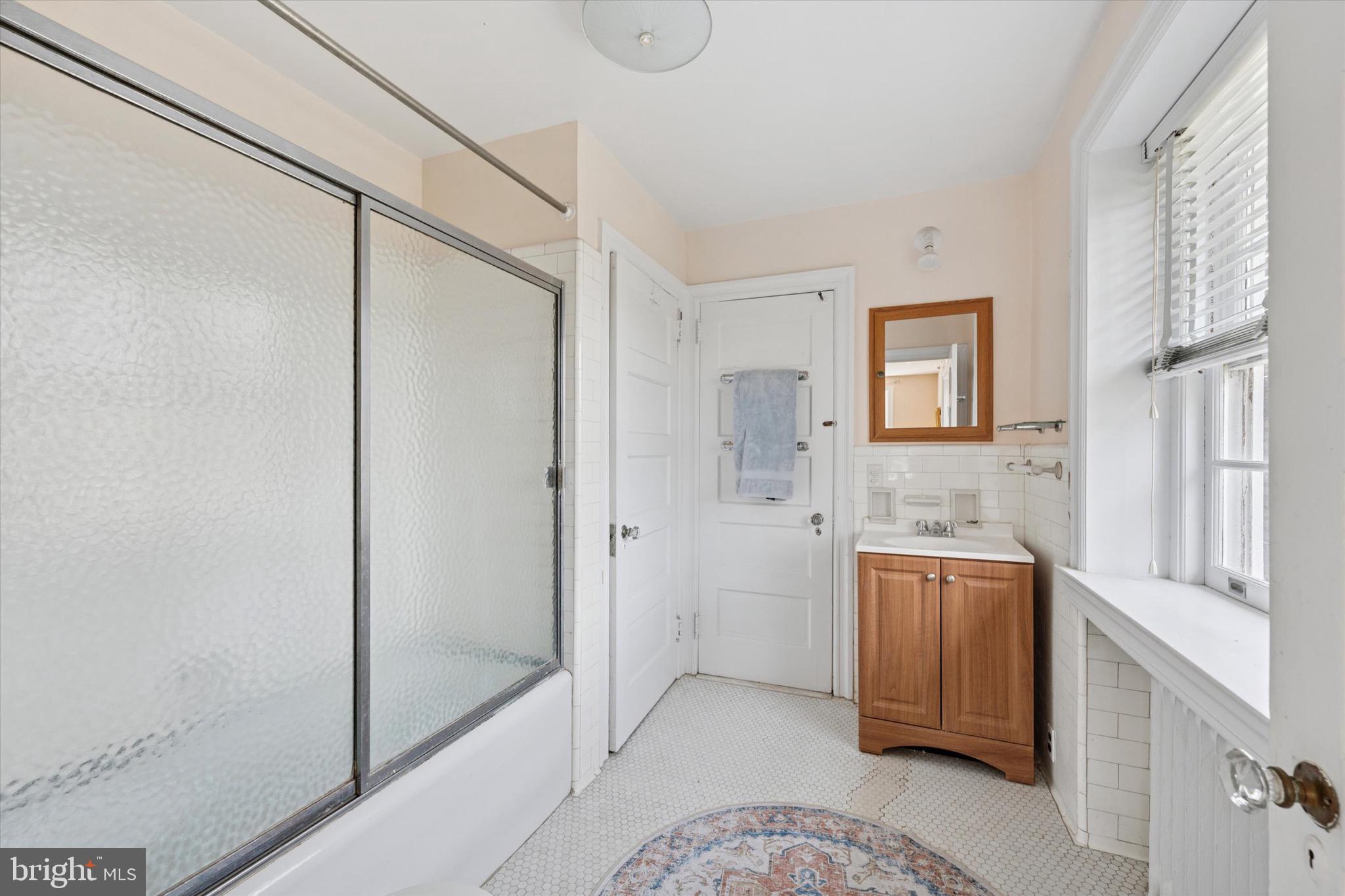 402 Penn Road Wynnewood, PA 19096 - Photo 47 of 75 a bathroom with a shower and a sink