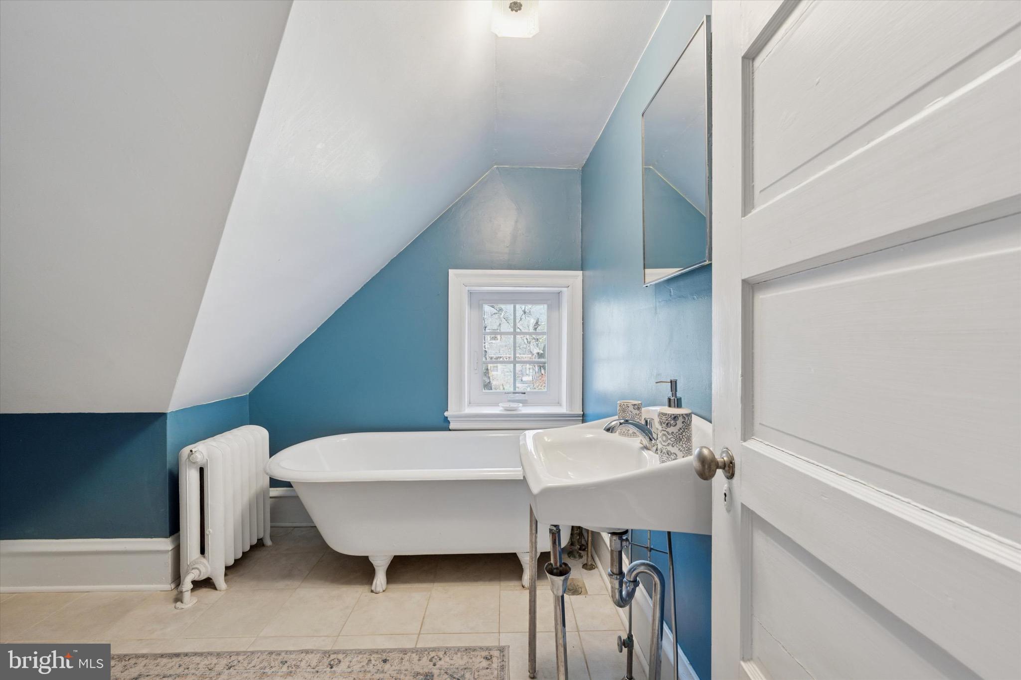 402 Penn Road Wynnewood, PA 19096 - Photo 59 of 75 a bathroom with a sink and a mirror
