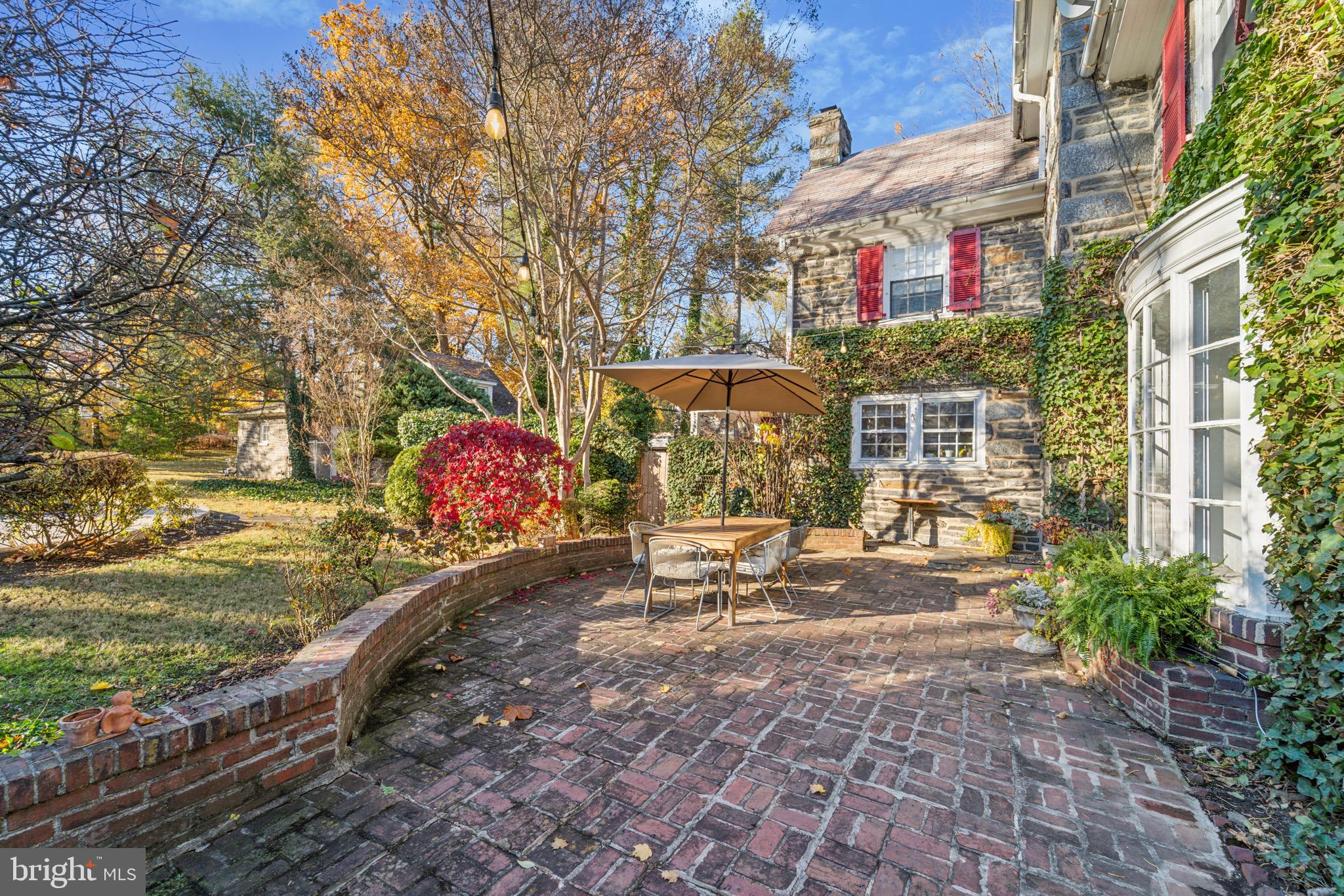 402 Penn Road Wynnewood, PA 19096 - Photo 9 of 75 a view of a patio with table and chairs and potted plants