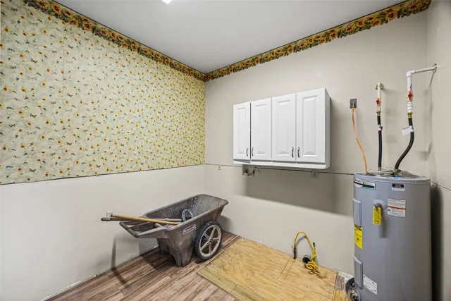 a kitchen that has a sink and a stove