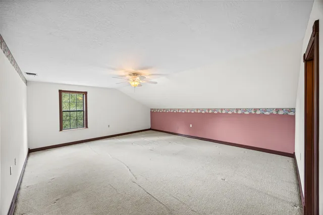 a bathroom with a sink vanity granite tub and shower
