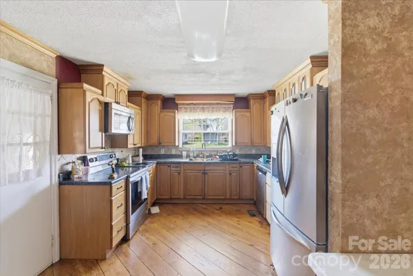 $455,000 | 309 Springwood Avenue, Gibsonville, NC 27249