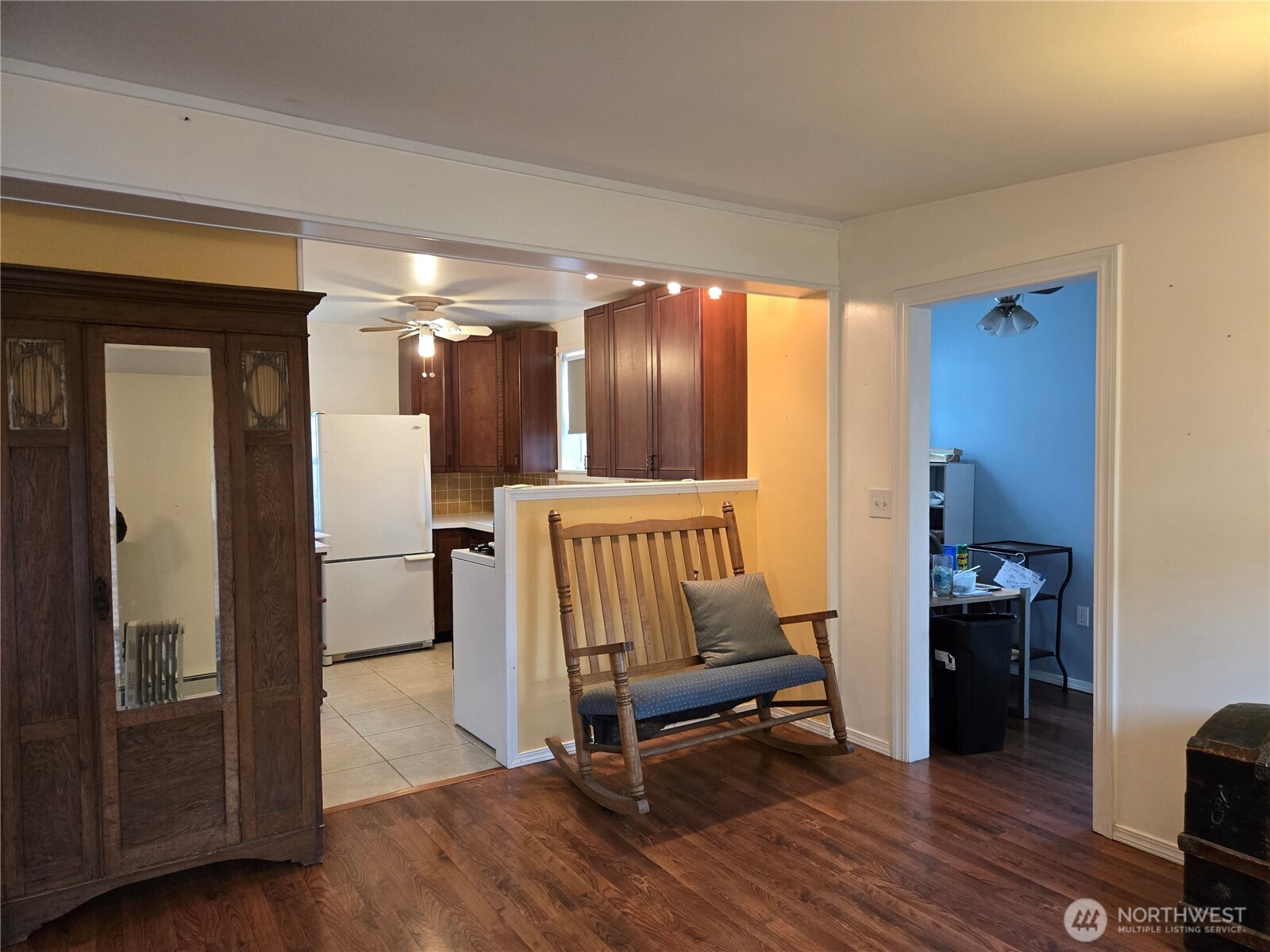 2205 300th Place Ocean Park, WA 98640 - Photo 11 of 20 a view of a hallway with wooden floor and furniture