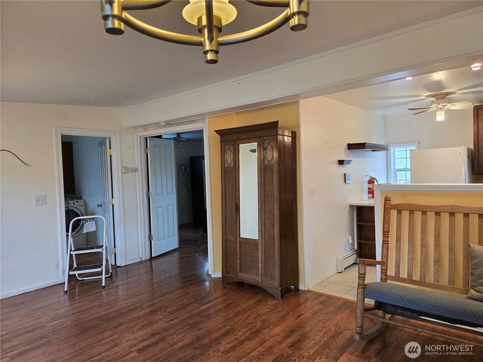 2205 300th Place Ocean Park, WA 98640 - Photo 13 of 20 wooden floor in an empty room with a window