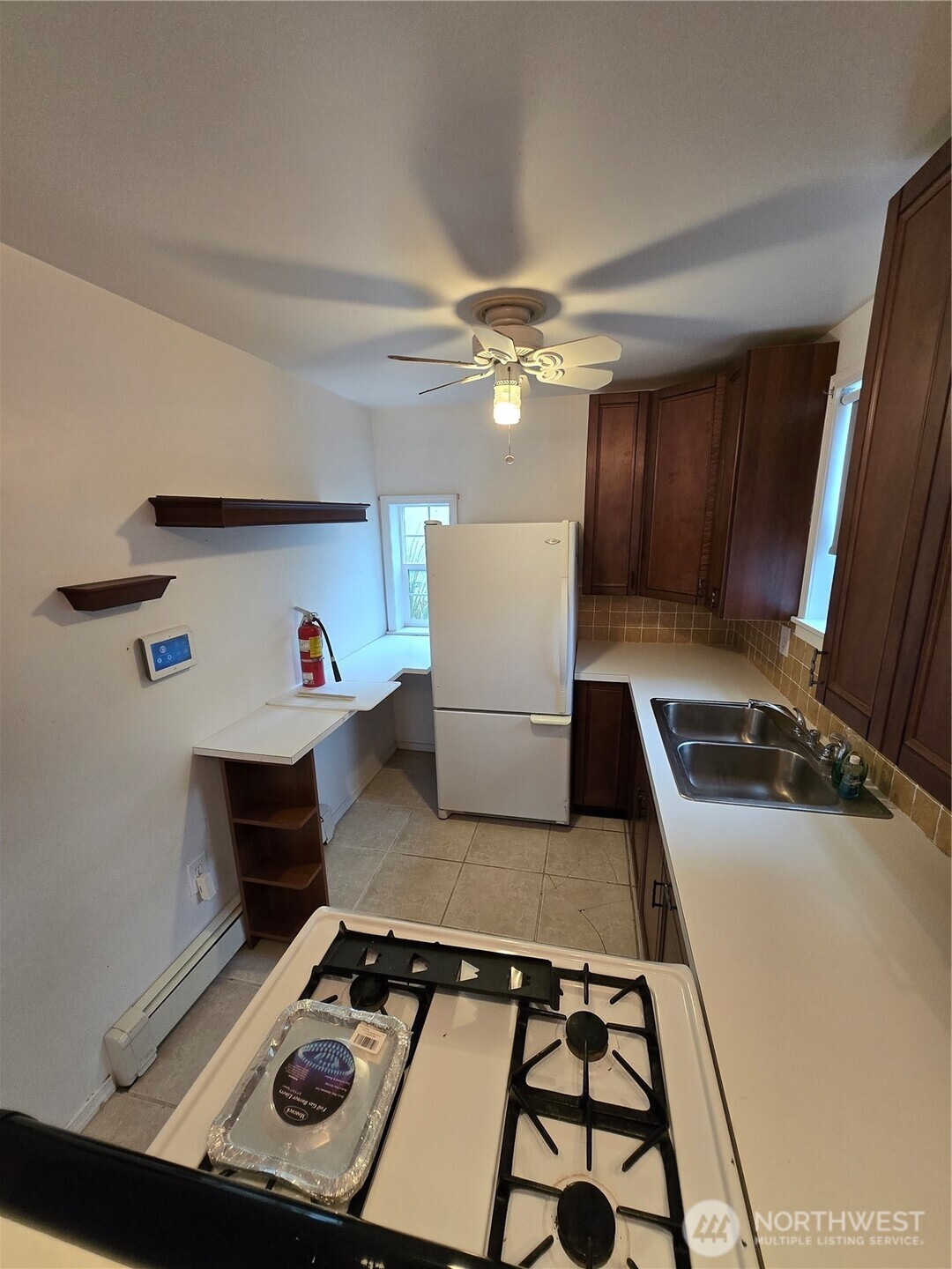 2205 300th Place Ocean Park, WA 98640 - Photo 15 of 20 a kitchen with a stove and a refrigerator
