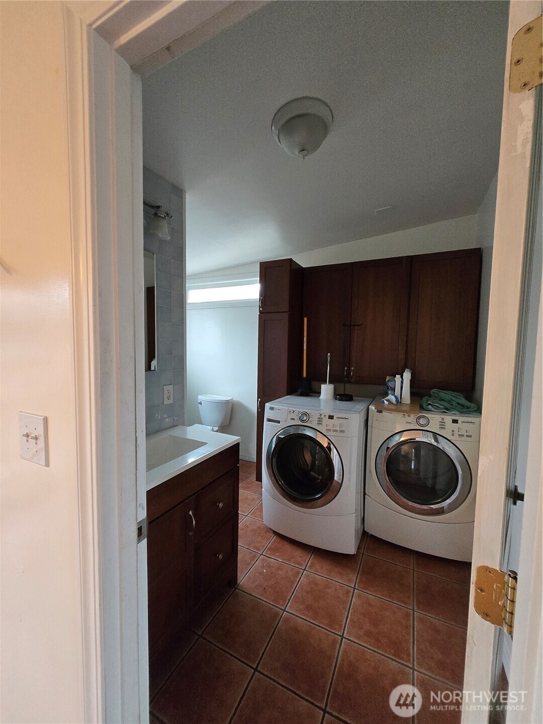 2205 300th Place Ocean Park, WA 98640 - Photo 17 of 20 a view of a room with washer and dryer