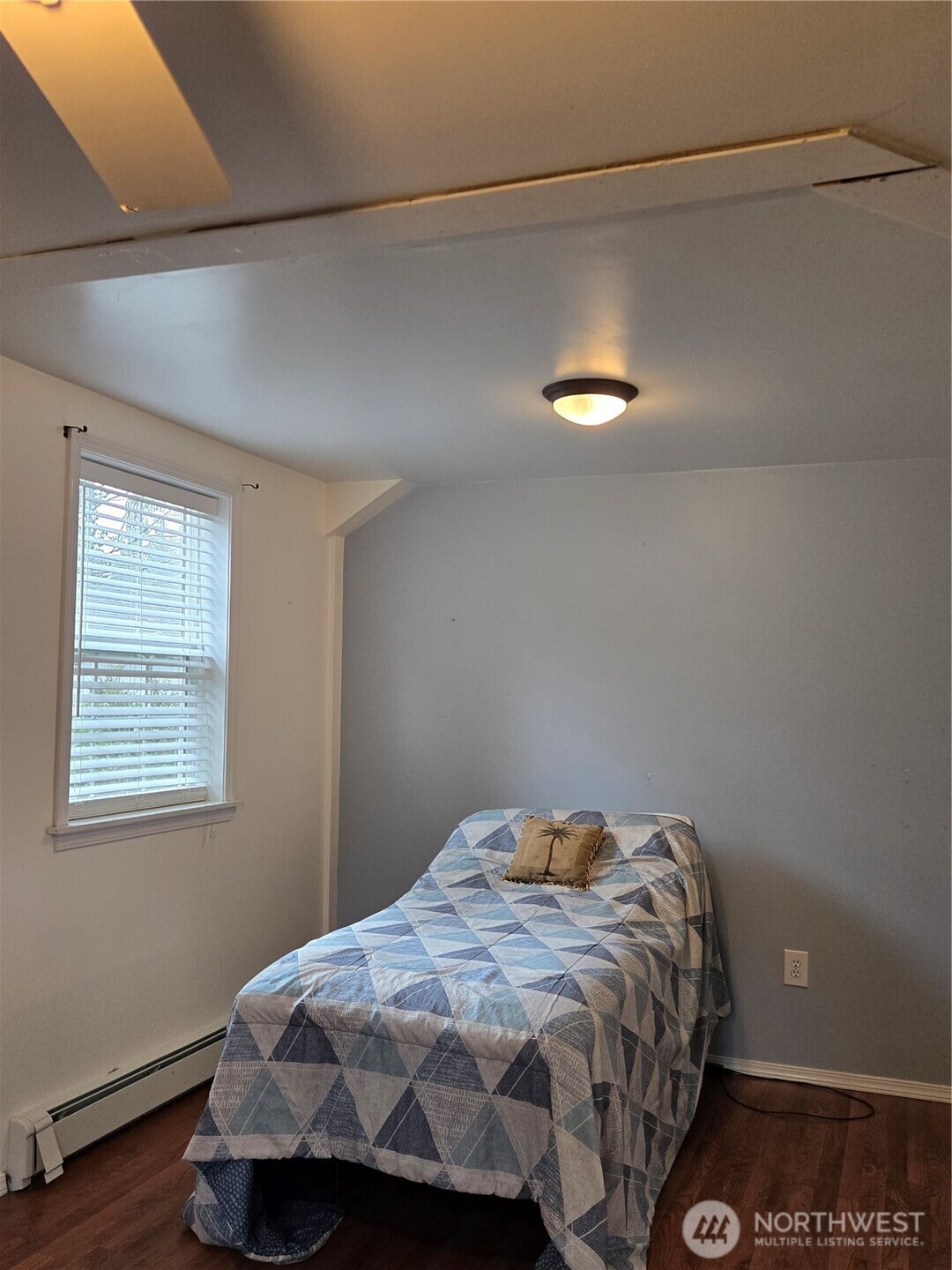 2205 300th Place Ocean Park, WA 98640 - Photo 19 of 20 a bedroom with a bed and a window