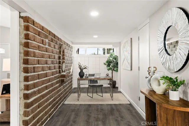 a view of entryway with wooden floor