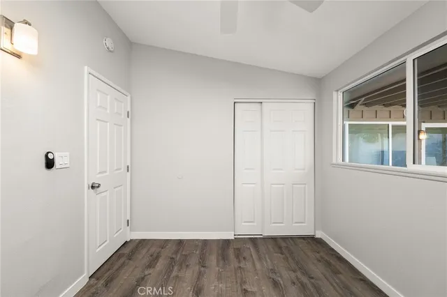 a view of bathroom with a brick wall