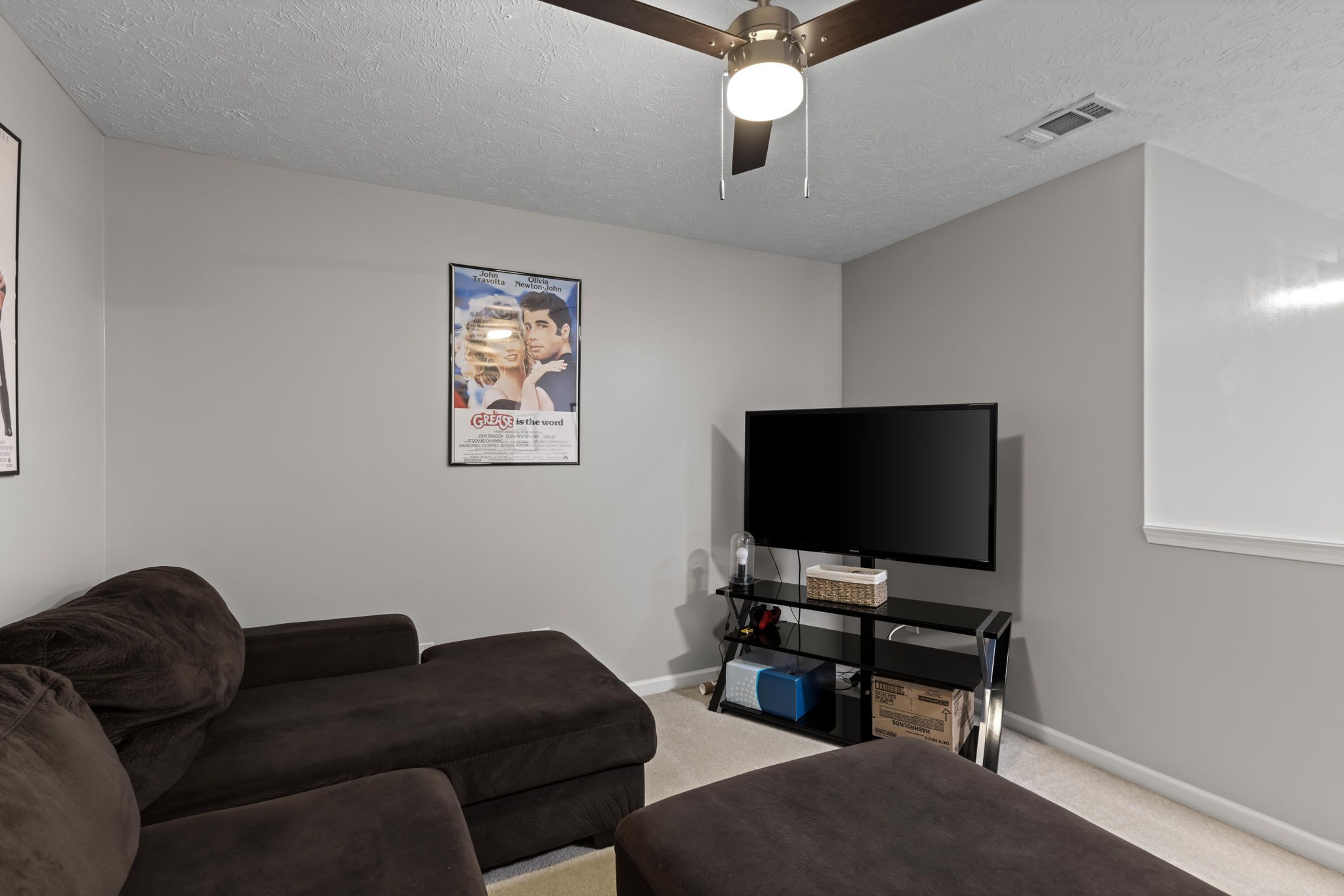 7 Shady Valley Drive Lebanon, TN 37087 - Photo 23 of 51 a living room with furniture and a flat screen tv