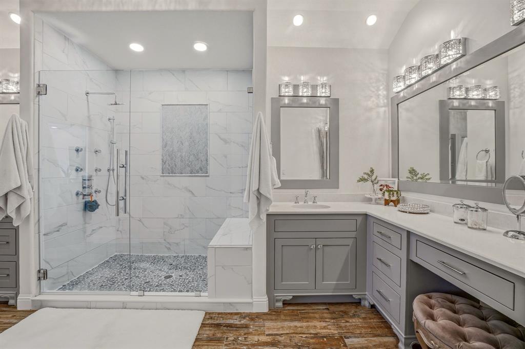 2009 Tree Top Court Granbury, TX 76049 - Photo 25 of 40 a bathroom with a double vanity sink mirror and shower