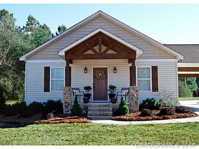 3334 Beaty Road Gastonia, NC 28056 - Photo 2 of 16 front view of a house with a yard
