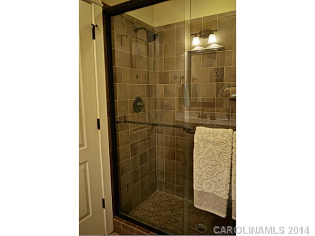 3334 Beaty Road Gastonia, NC 28056 - Photo 11 of 16 a bathroom with a shower