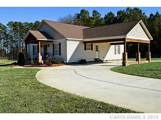 3334 Beaty Road Gastonia, NC 28056 - Photo 3 of 16 a view of house with outdoor space and sitting area