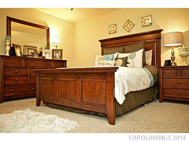 3334 Beaty Road Gastonia, NC 28056 - Photo 9 of 16 a bedroom with a bed and a dresser