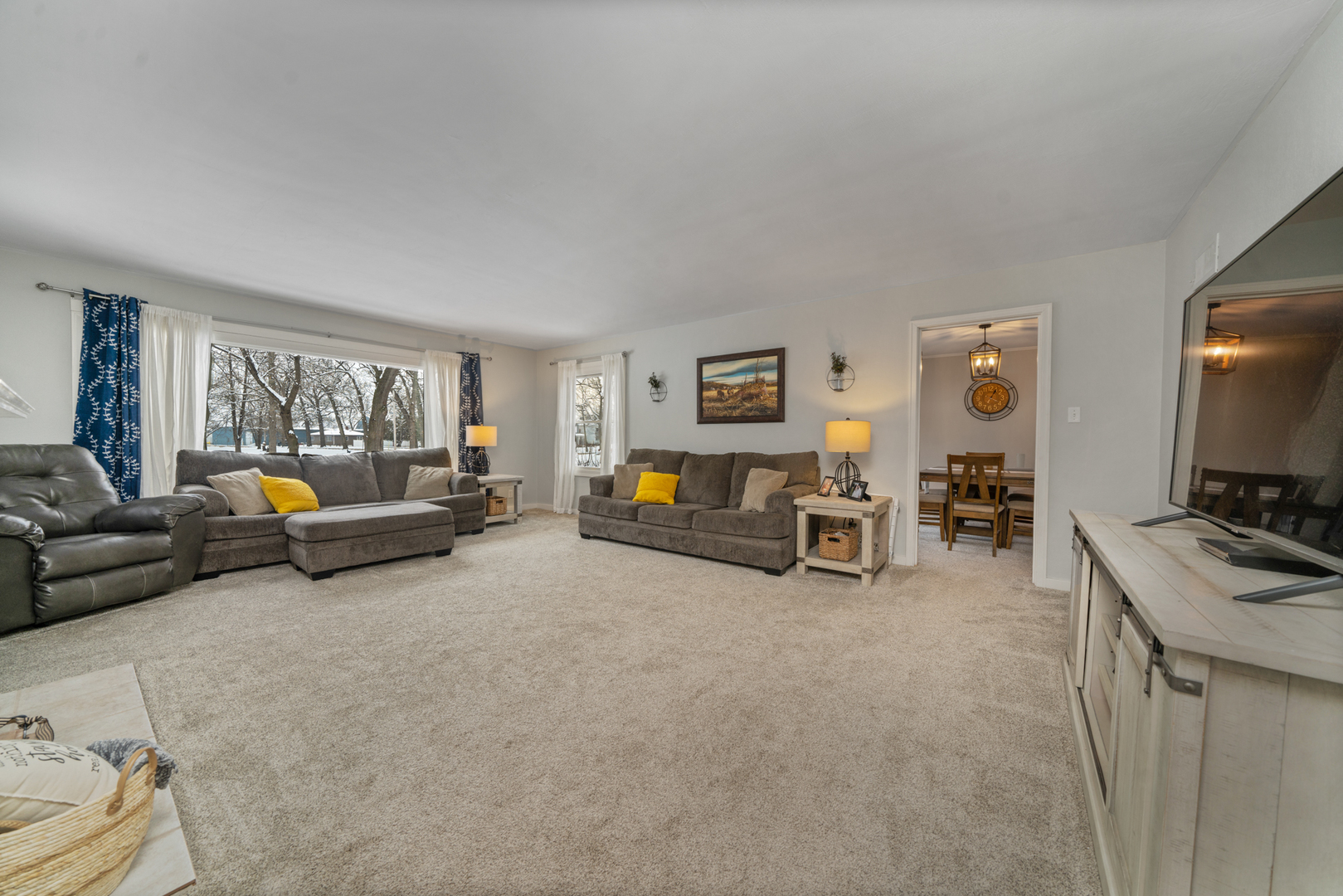 1628 Lee Center Road Amboy, IL 61310 - Photo 18 of 33 a living room with furniture and a flat screen tv