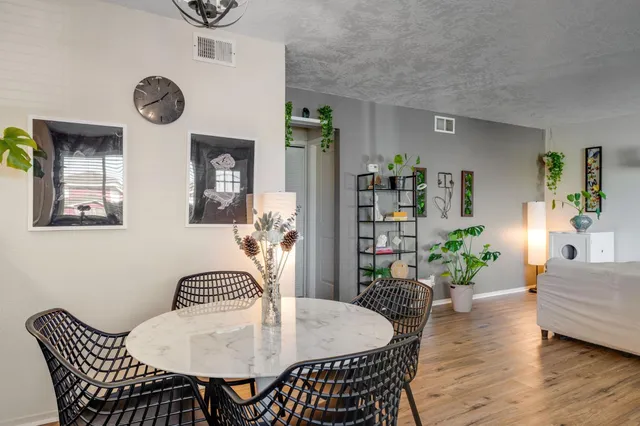 a view of a dining room with furniture