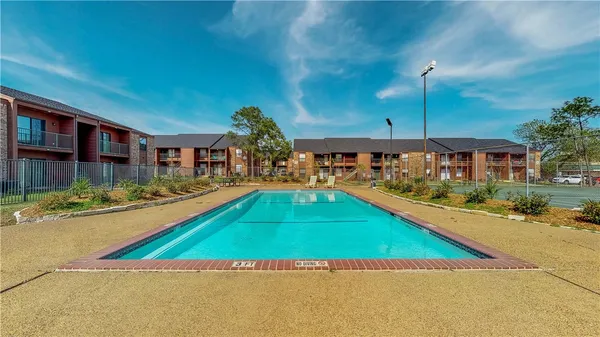 a view of a house with swimming pool