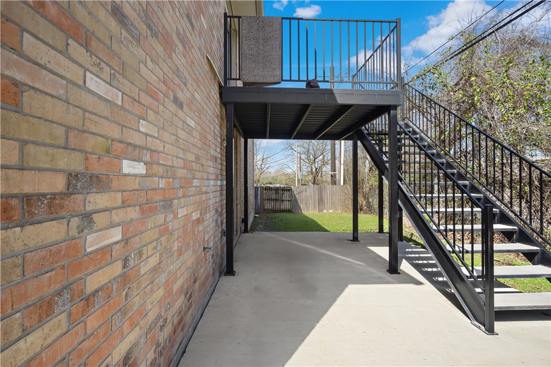 401 Park Road, Unit AB College Station, TX 77840 - Photo 21 of 22 a view of balcony with wooden floor and outdoor seating