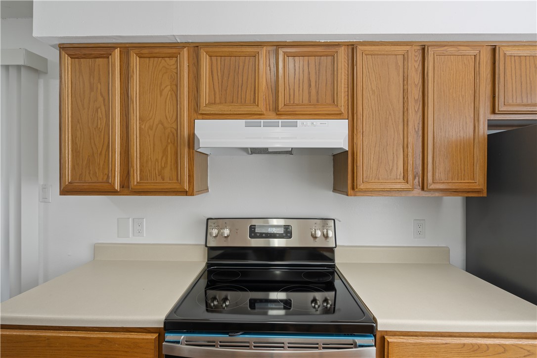 401 Park Road, Unit AB College Station, TX 77840 - Photo 10 of 22 a stove top oven sitting inside of a kitchen