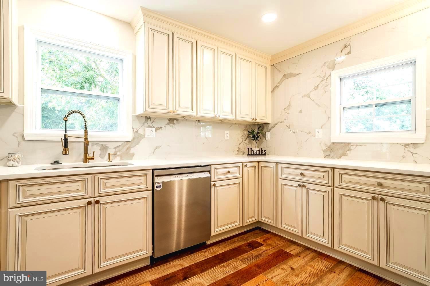 431 East Park Avenue Maple Shade, NJ 08052 - Photo 12 of 36 a white kitchen with sink and window