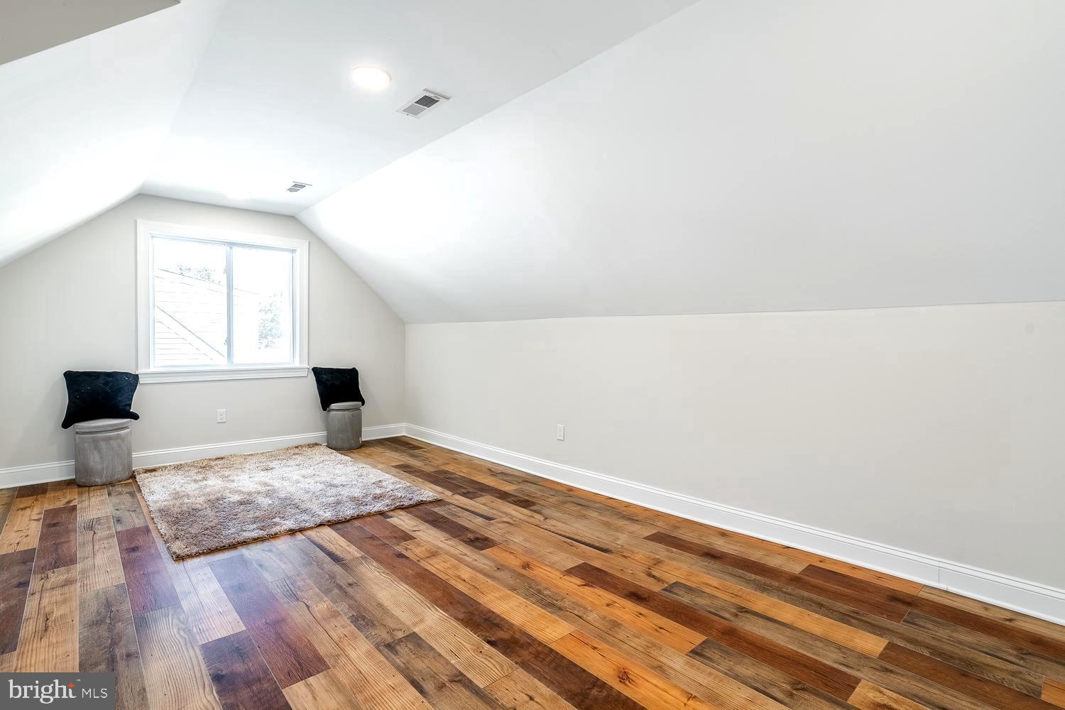 431 East Park Avenue Maple Shade, NJ 08052 - Photo 26 of 36 a view of kitchen and empty room with wooden floor