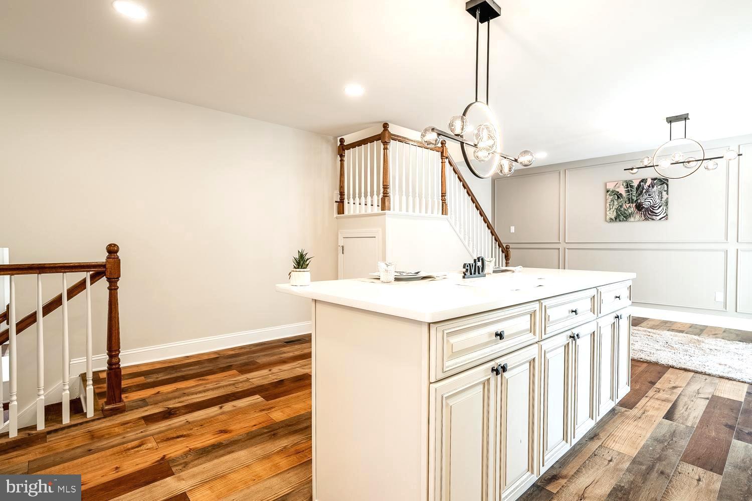 431 East Park Avenue Maple Shade, NJ 08052 - Photo 10 of 36 a kitchen that has a stove and a wooden floor