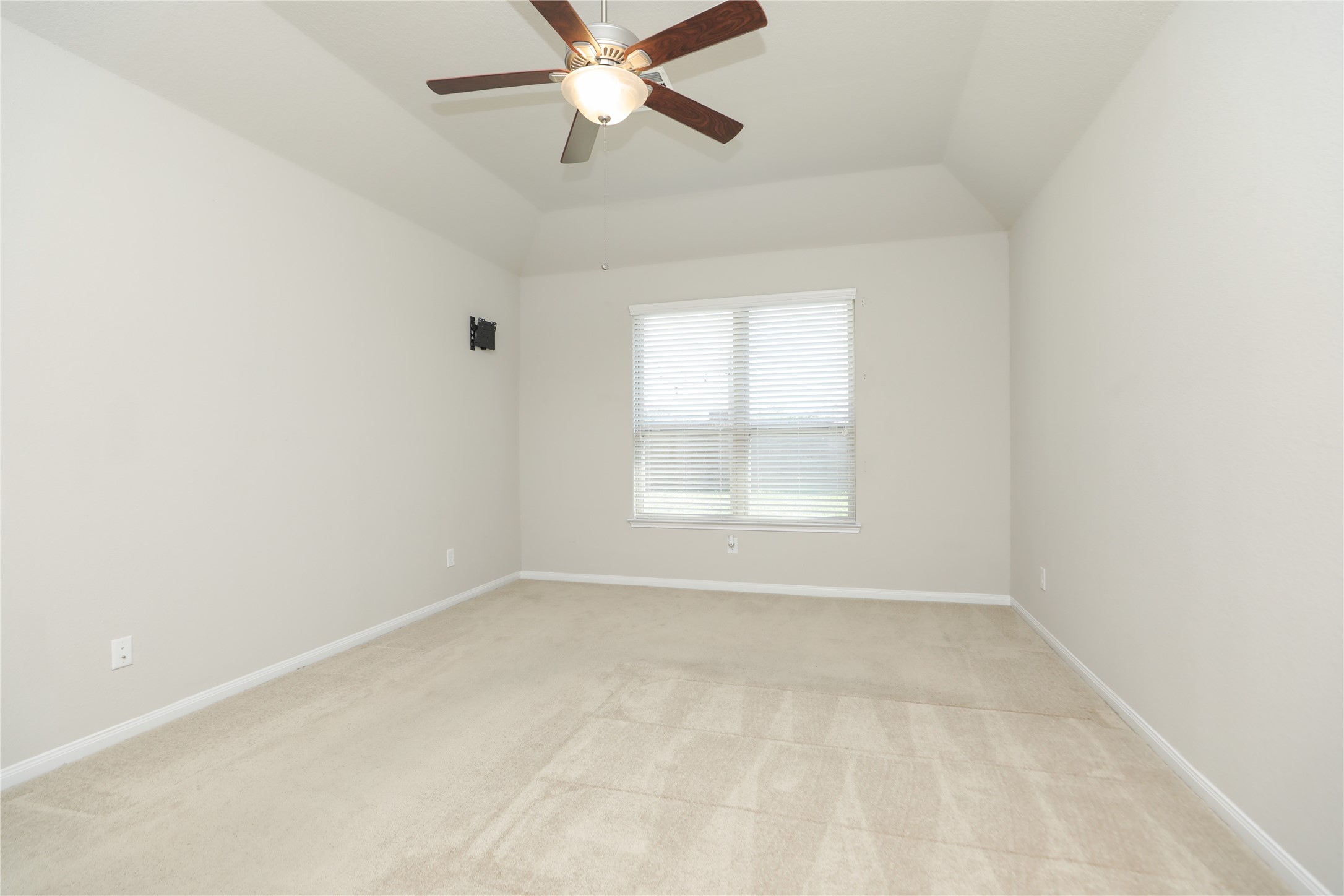 17506 Field Row Trail Hockley, TX 77447 - Photo 8 of 27 an empty room with a window and a fan