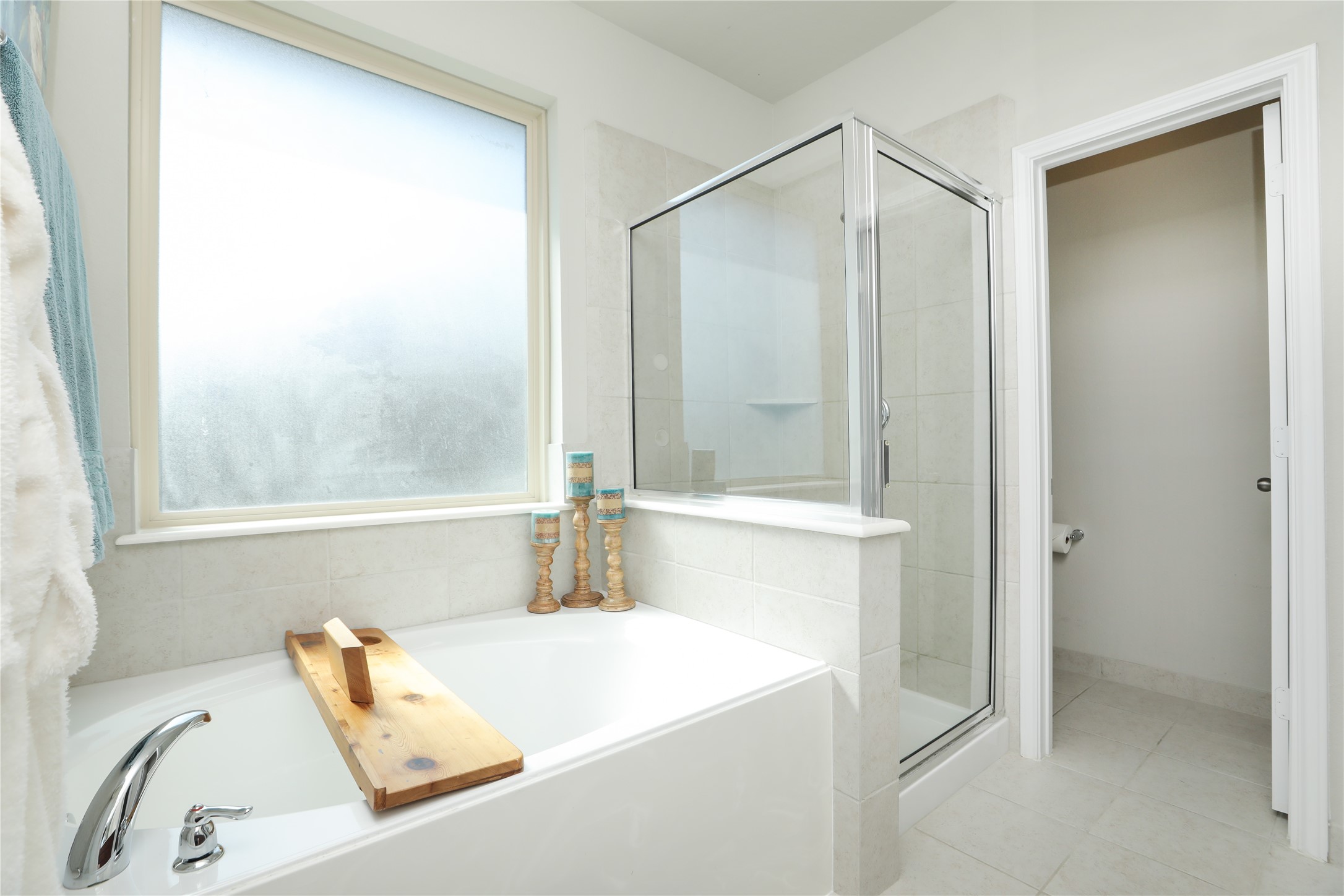 17506 Field Row Trail Hockley, TX 77447 - Photo 11 of 27 a bathroom with a tub and a shower