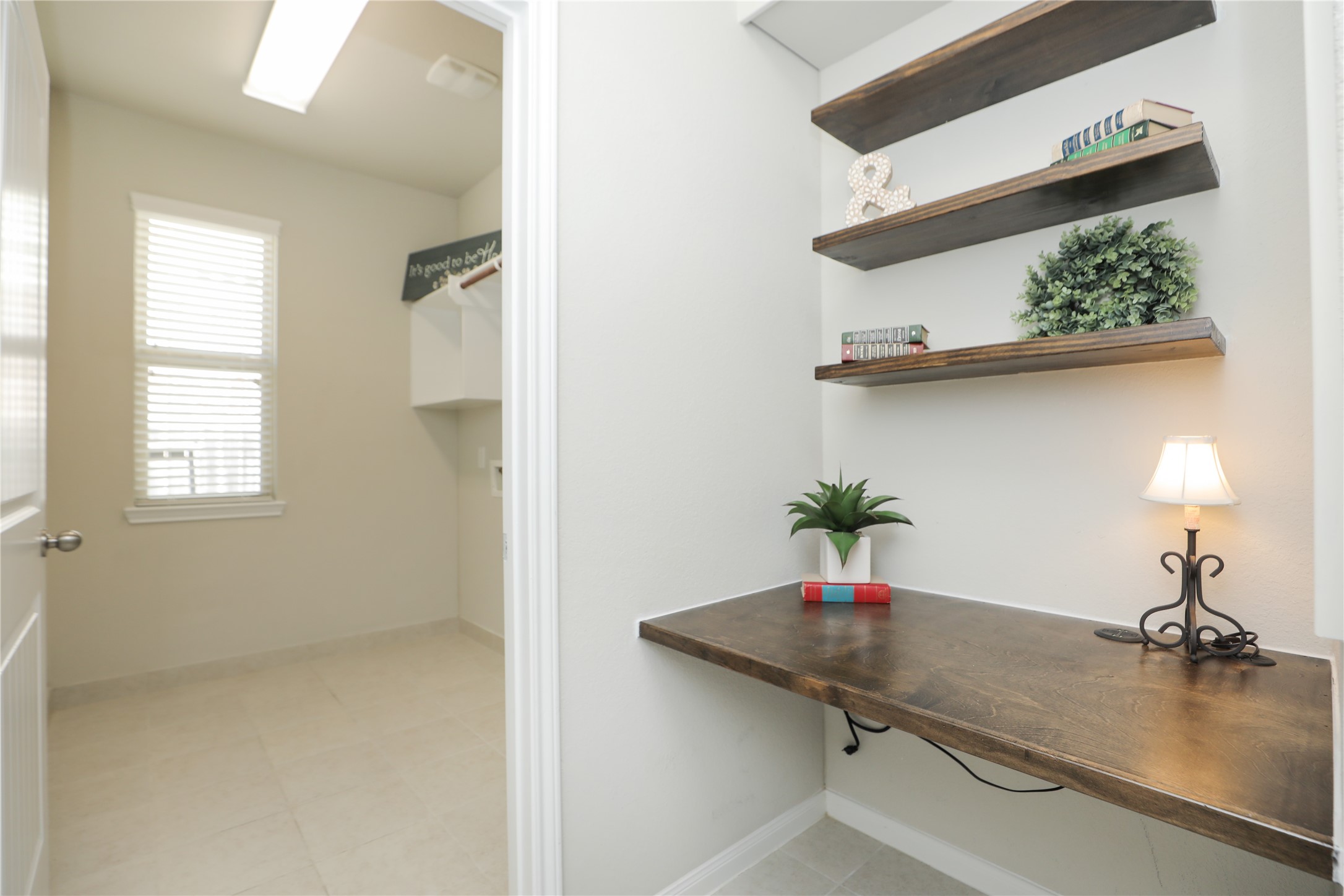 17506 Field Row Trail Hockley, TX 77447 - Photo 19 of 27 a kitchen with a sink and a potted plant