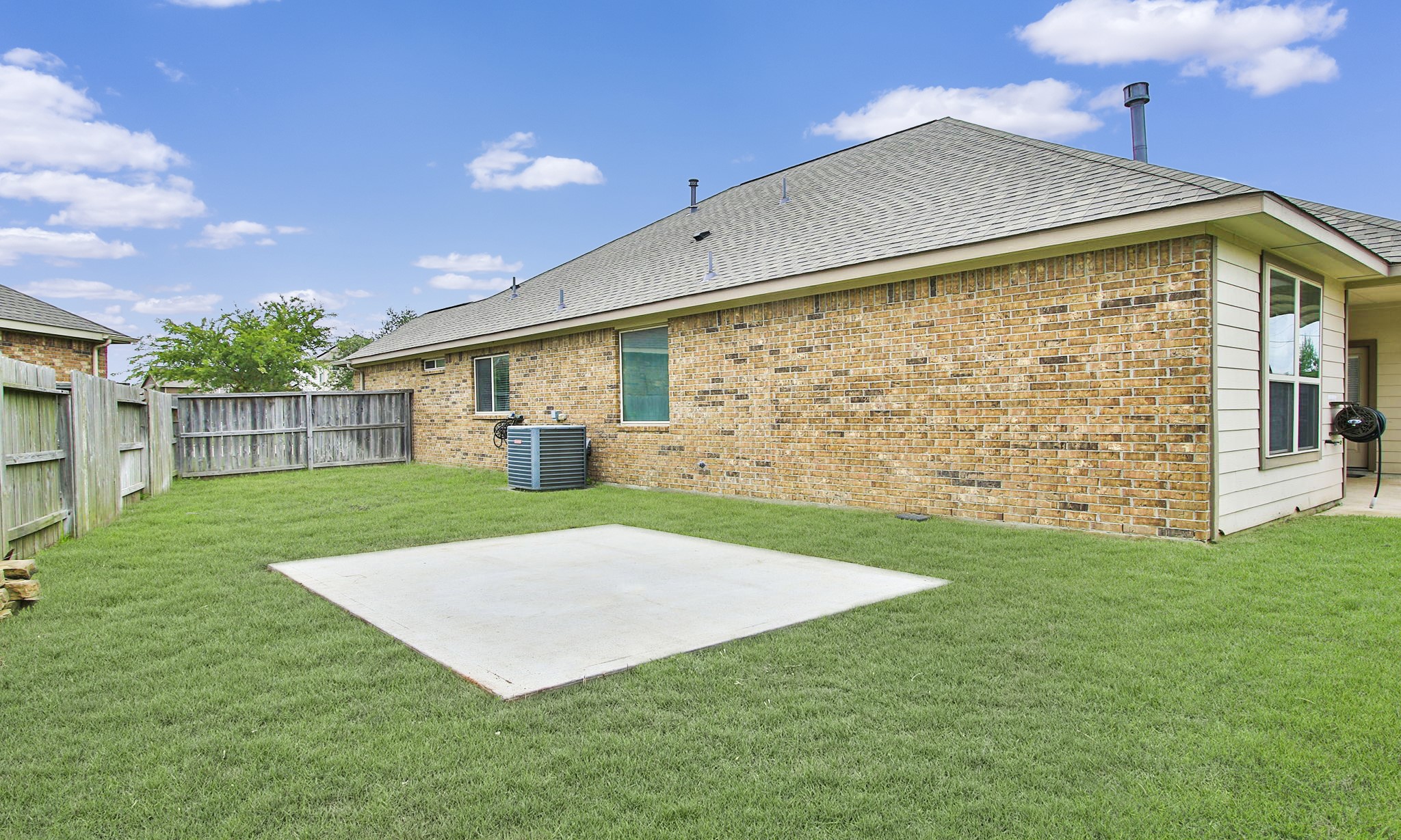 17506 Field Row Trail Hockley, TX 77447 - Photo 24 of 27 a view of an house with backyard and garden