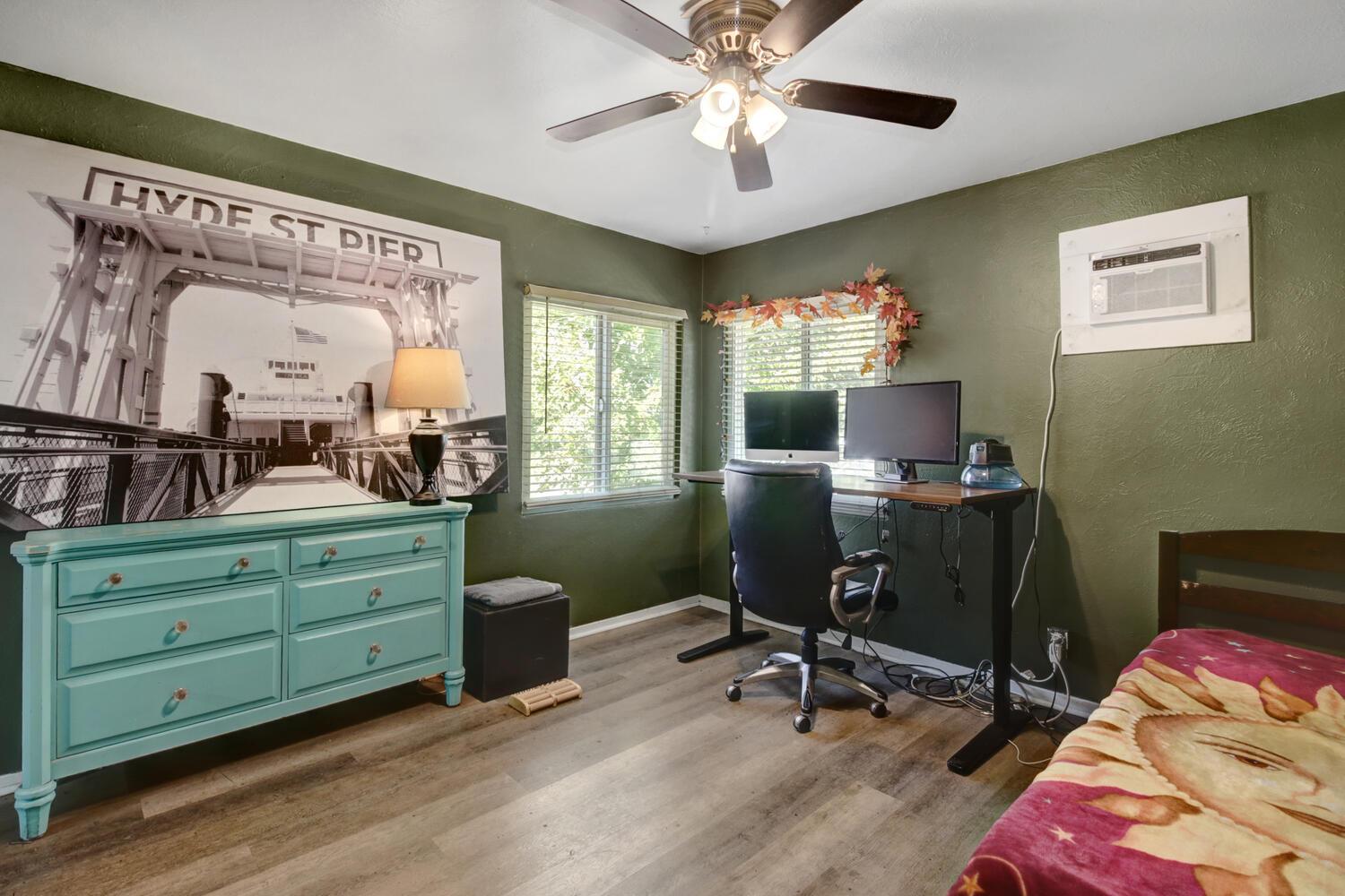 218 Folsom Road Roseville, CA 95678 - Photo 30 of 37 a view of a workspace with furniture and a window