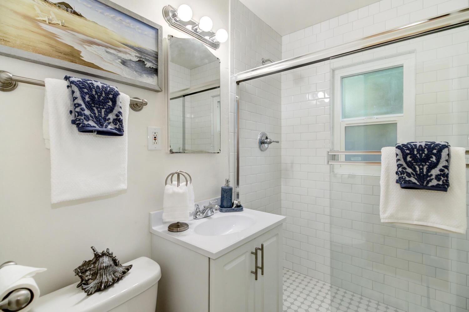 218 Folsom Road Roseville, CA 95678 - Photo 5 of 37 a bathroom with a sink mirror and vanity