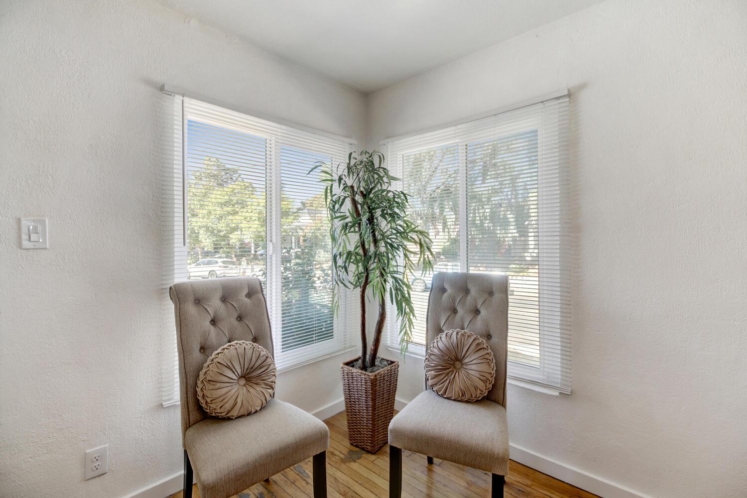218 Folsom Road Roseville, CA 95678 - Photo 8 of 37 a living room with furniture and a potted plant