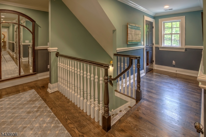 5 Burnett Road Mendham, NJ 07945 - Photo 33 of 50 a view of an entryway with wooden floor and windows
