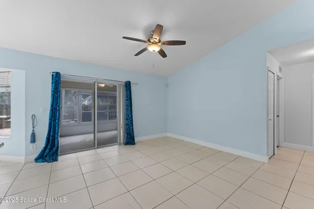 a view of an empty room and window