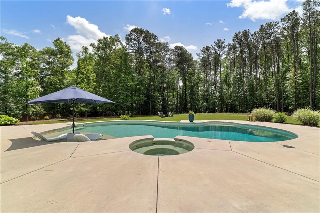 1273 Villa Rica Road Powder Springs, GA 30127 - Photo 64 of 69 a view of a swimming pool with a yard
