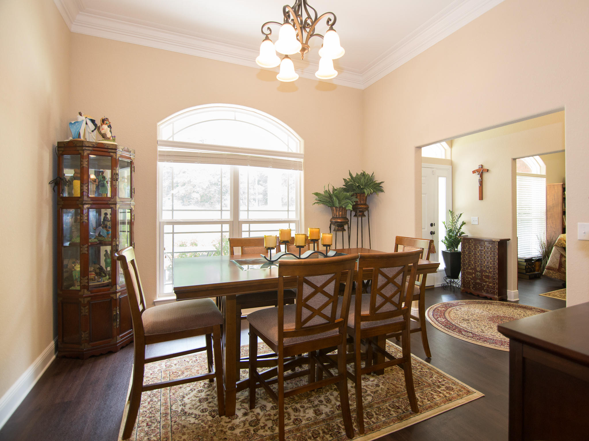 521 Vale Loop Crestview, FL 32536 - Photo 8 of 33 a view of a dining room with furniture window and wooden floor